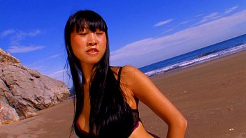 Natural-tits Hot asian Pornstar Sharon Lee stripping at the beach