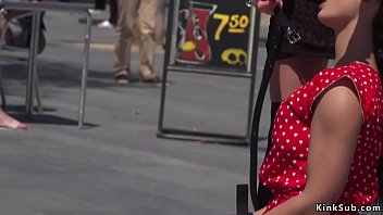 Bondage Petite babe lets mistress d. her in public