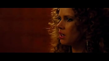 Brunette Amy Adams, Jennifer Lawrence in American Hustle