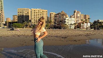 Amateur Wet shoot on a public beach with Crazy Model. Risky outdoor masturbation. Foot fetish. Pee in jeans.