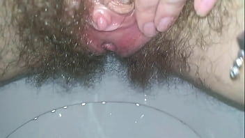 Pissing pissing and handjob on the toilet. My naughty stepmom took the phone to the toilet and took a close-up of her wet clit Nimfa Mannay